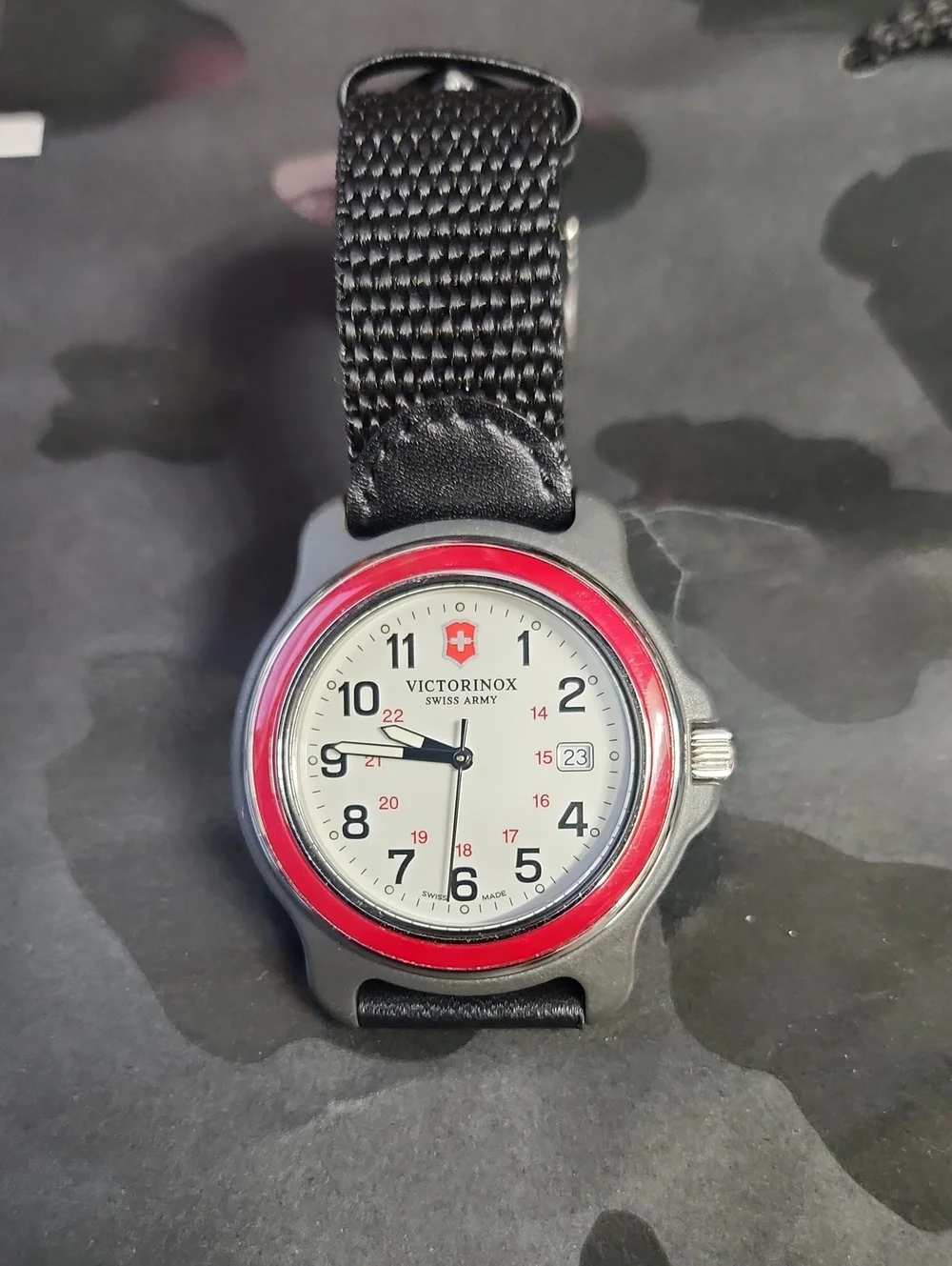 Victorinox Red-Bezel Silver Field Watch with Black Strap